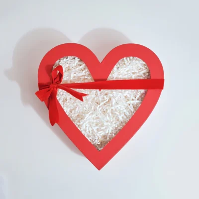 HEART BOX A beautifully crafted heart-shaped box designed for romantic gifting. Sturdy and spacious, it is perfect for holding meaningful keepsakes