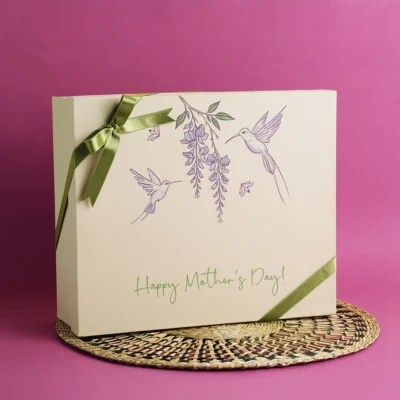 SERENITY BOX Elegant and calming, the Lilac Serenity Box is designed to elevate your gifting experience. With its soft hues and refined finish, it beautifully holds and presents curated selections.